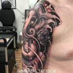Oberarm Tattoo mit Ganesha Motiv