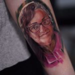Bild einer Frau als Tattoo