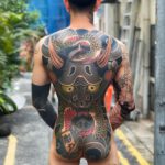 Bodysuit Tattoo auf dem ganzen Rücken mit schwarzem Oni Motiv